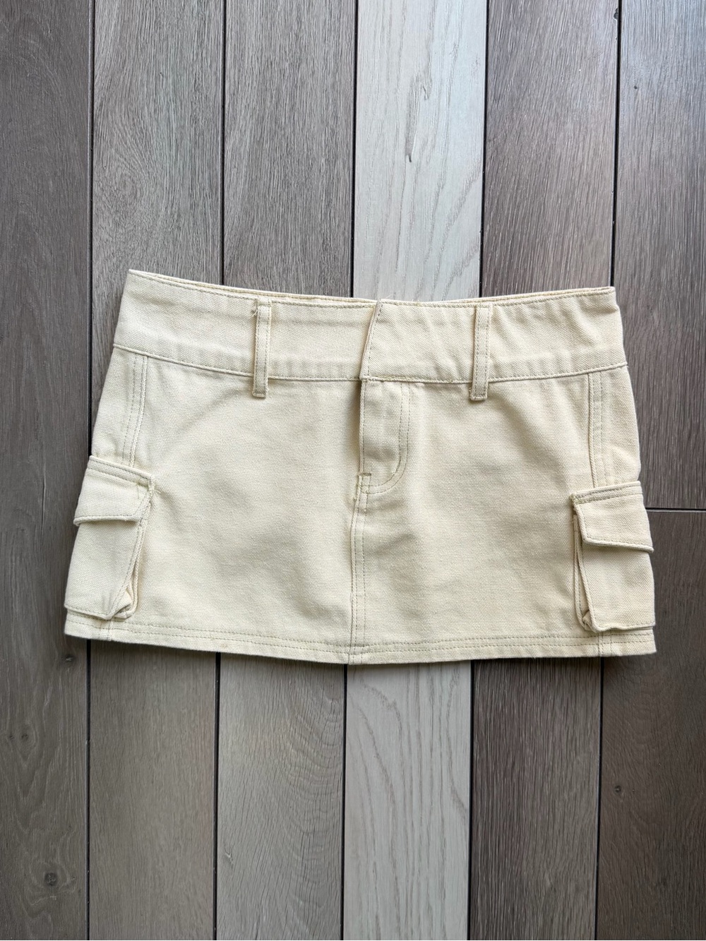 Princess Polly cream-colored cargo mini skirt